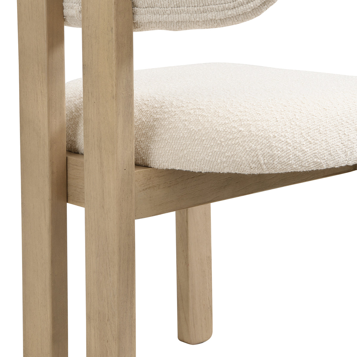 Chair with wooden legs and a cushioned seat on a white background