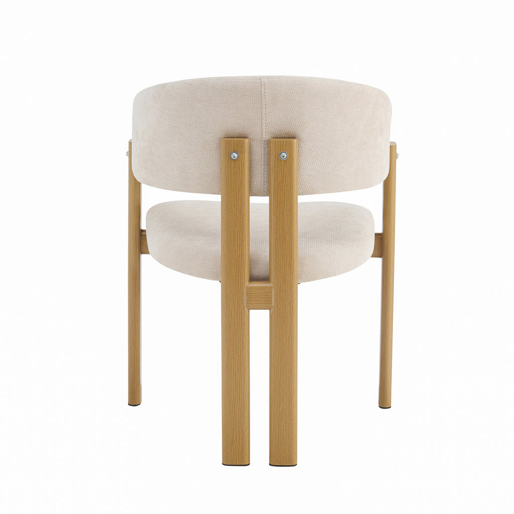 A modern dining chair with a light beige upholstered seat and backrest, supported by a light natural wood frame, shown from the rear on a white background.