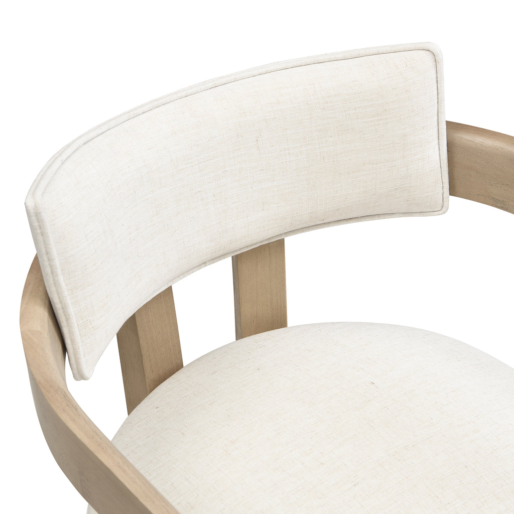 Close-up of a chair with beige cushioned backrest and seat on a white background